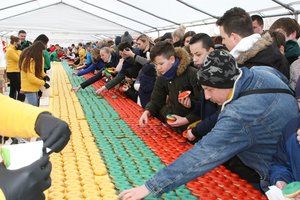 Saldi Kovo 11-oji Marijampolėje – džiaugėsi trispalve iš 4500 spurgų