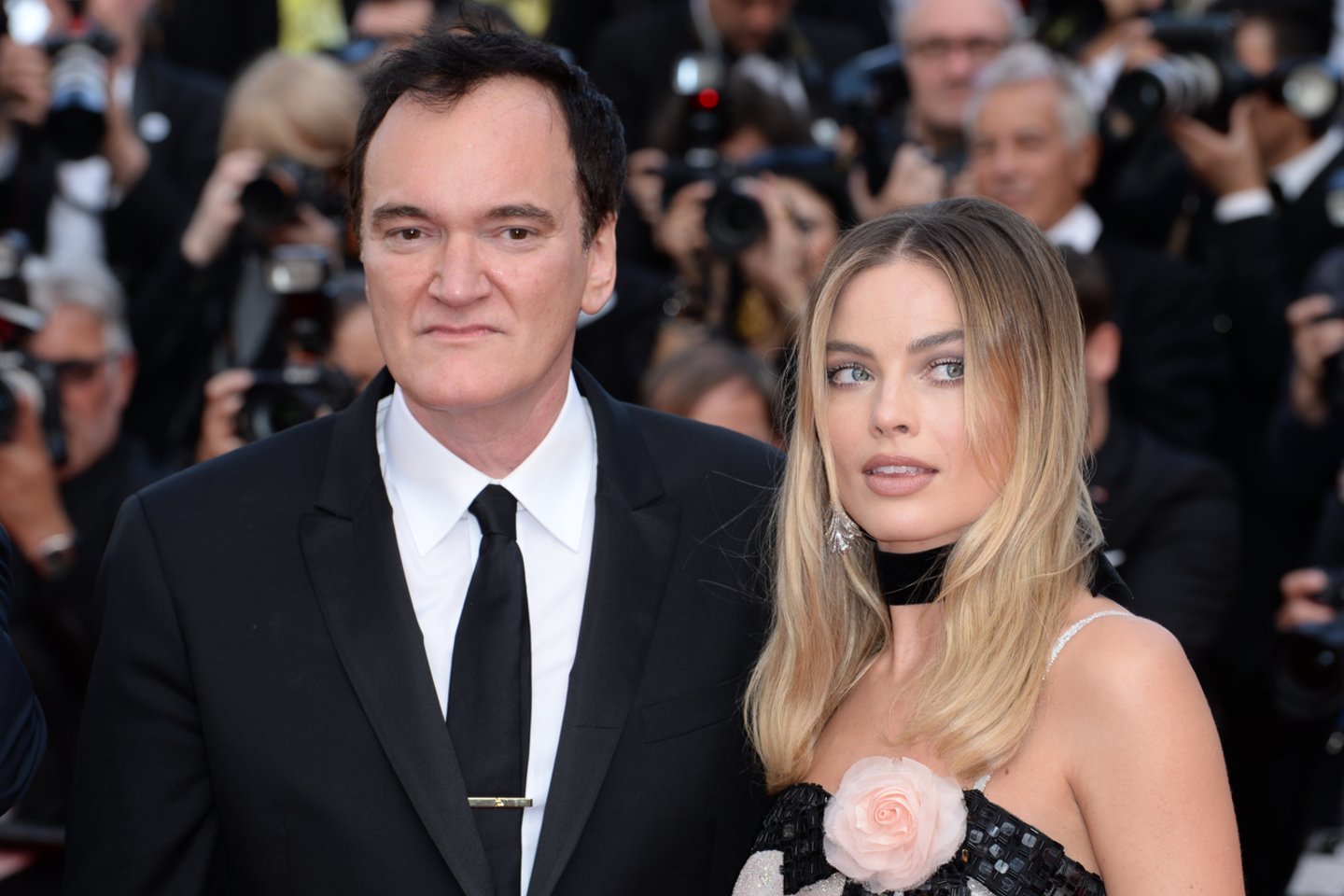  Quentinas Tarantino ir Margot Robbie.<br>PA Pictures/ Scanpix nuotr.