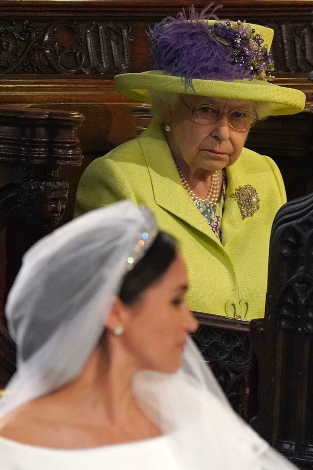 Elizabeth II ir Meghan Markle. <br>Scanpix/AFP nuotr.
