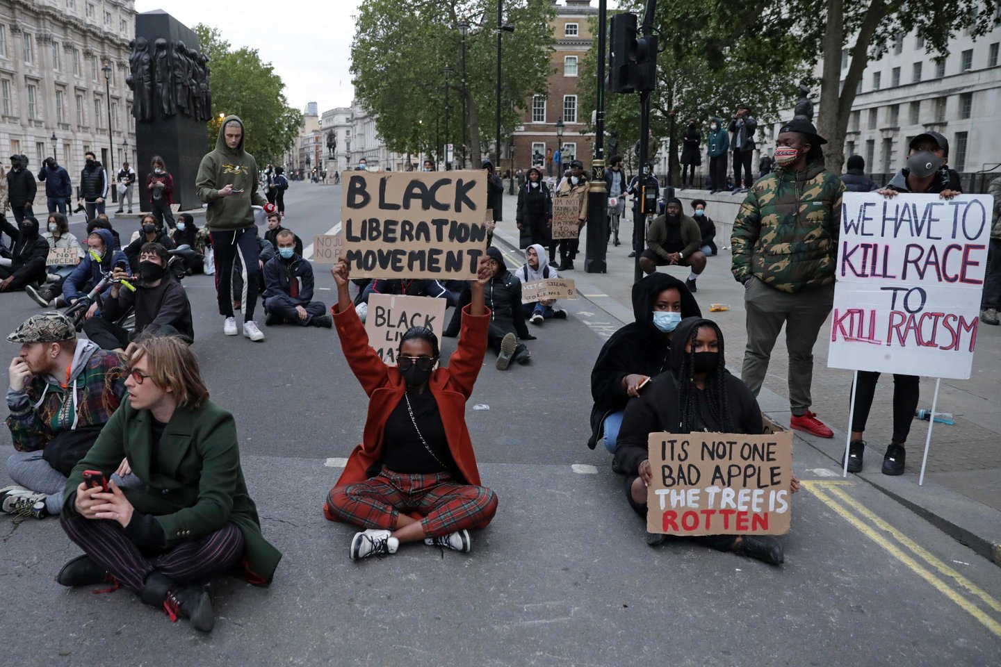  Protestas Londone.<br> AFP/Scanpix nuotr.