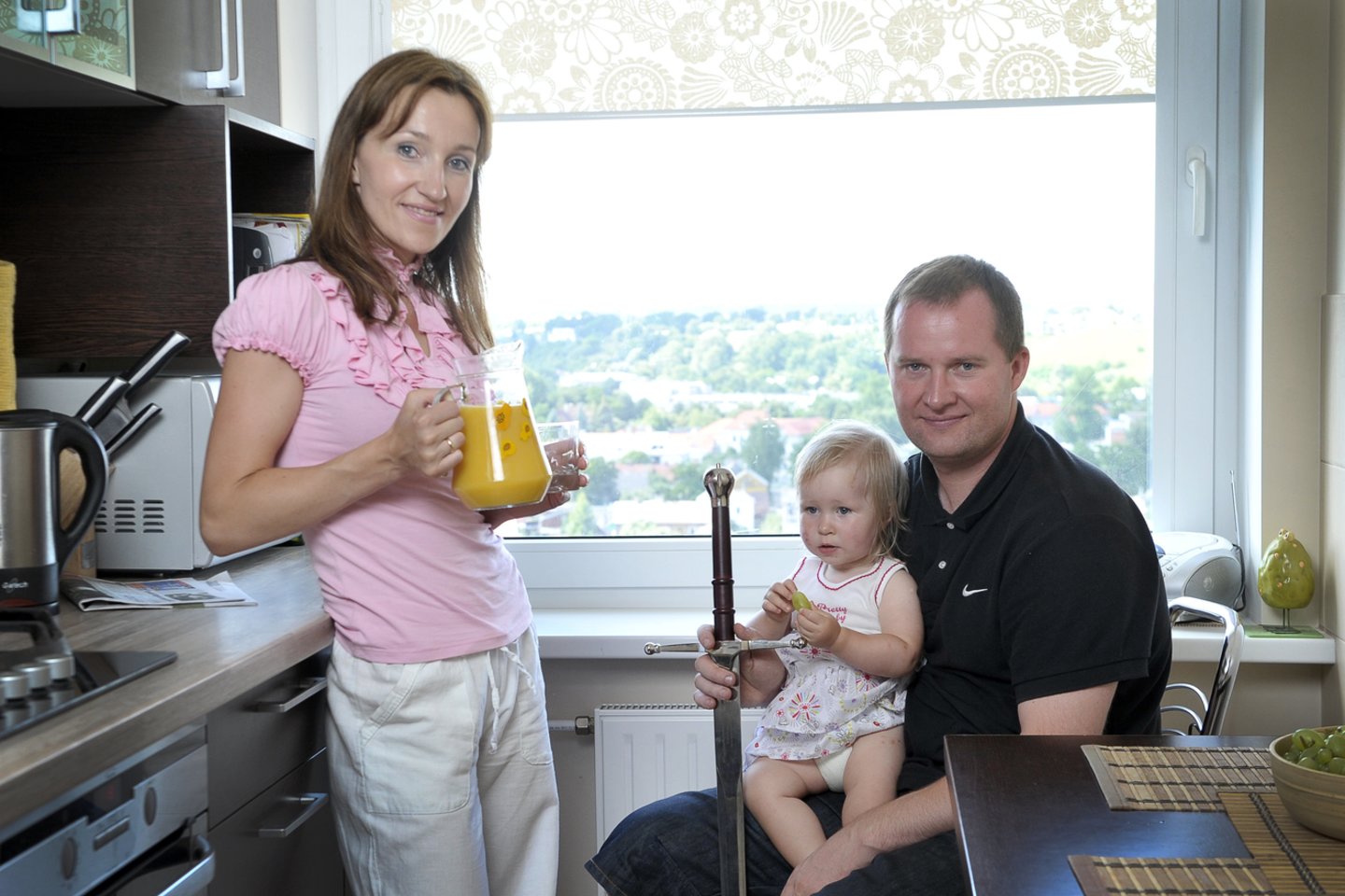  2011-ieji. K.Maksvytis su su žmona Egle ir vaiku.<br> R.Neverbicko nuotr.