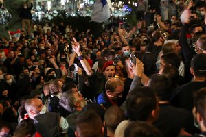 Serbijos policija susirėmė su protesto prieš naują karantiną dalyviais