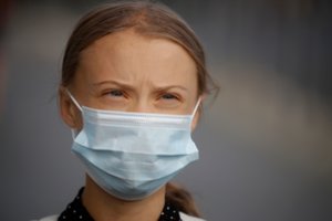 A. Merkel priėmė Gretą Thunberg deryboms dėl klimato krizės