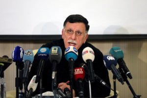 Besivaržančios Libijos vyriausybės paskelbė paliaubas ir planuoja visuotinius rinkimus