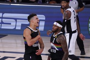 „Nuggets“ nenuleidžia rankų: įspūdingą spurtą surengęs klubas išplėšė septintąjį serijos mačą