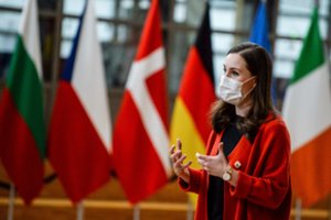 Suomijos premjerė izoliuosis dėl kontakto su koronavirusu užsikrėtusiu deputatu