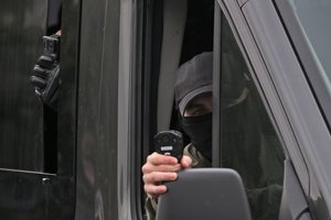 Baltarusijoje sulaikytam JAV analitikui nuo šiol taikomas namų areštas