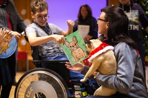 Užsiėmimai su šunimis padeda judėti tiems, kuriems tai buvo neįveikiama užduotis