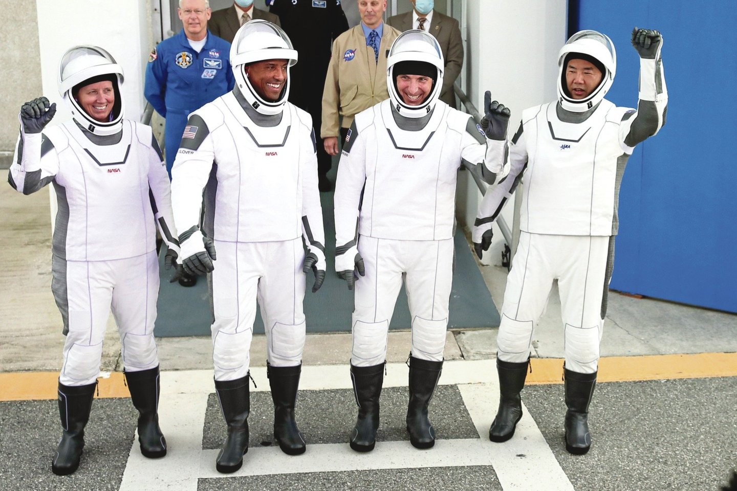 Keturi astronautai dirbs Tarptautinėje kosminėje stotyje ir į Žemę sugrįš tiktai 2021 metų birželį.<br>AP/„Scanpix“ nuotr.