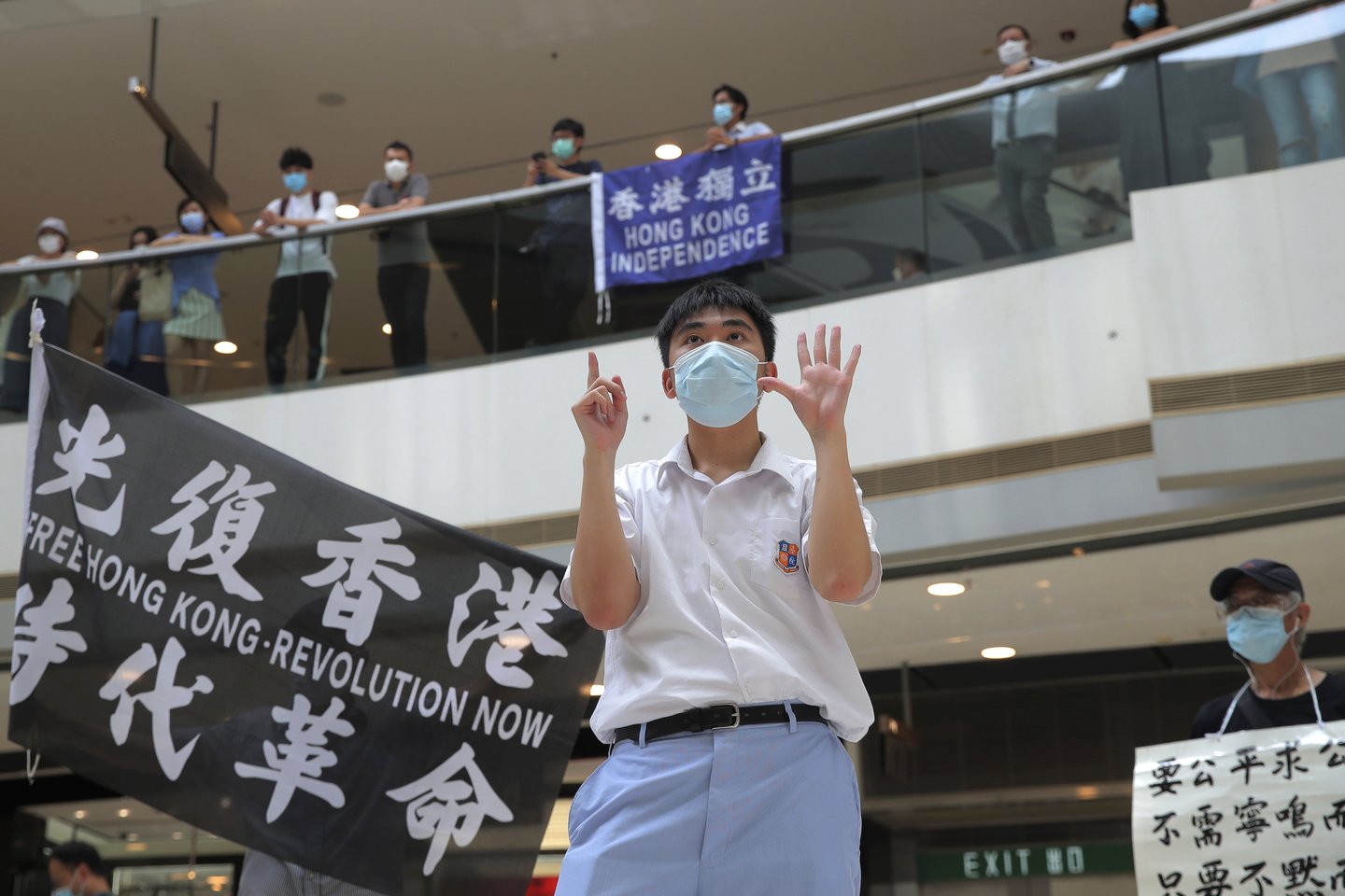  Virtinės šalių URM vadovai reikalauja Pekino vykdyti įsipareigojimus dėl Honkongo.  <br> AP/Scanpix nuotr.