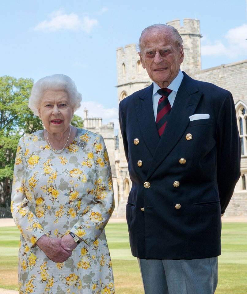 Jungtinės Karalystės monarchė Elizabeth II ir jos vyras princas Philipas.<br>PA/Scanpix nuotr.