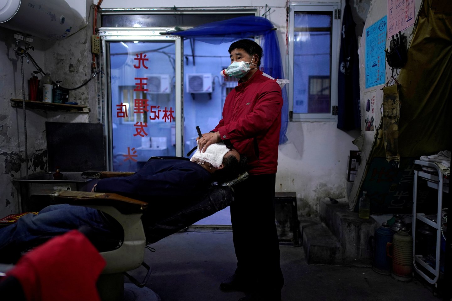  Uhane kilusi pandemija per metus pražudė daugiau kaip 1,8 mln. žmonių.<br> Reuters/Scanpix nuotr.