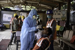 Jungtinėje Karalystėje pirmosios vakcinos nuo COVID-19 dozės sulaukė jau daugiau nei 20 mln. gyventojų