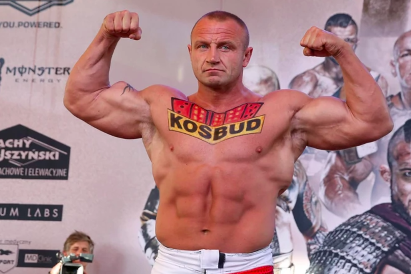  Buvusi pasaulio galiūnų sporto superžvaigždė Mariuszas Pudzianowskis po beveik pusantrų metų pertraukos vėl žengs į MMA (Mišrių kovos menų) narvą.<br> sport.onet.pl nuotr.