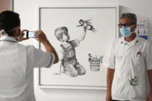Banksy piešinys „Christie's“ aukcione parduotas už rekordinius 16,75 mln. svarų 
