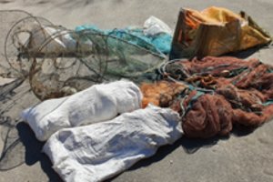 Sodybose prie Minijos upės aplinkosaugininkai rado 16 draudžiamų žvejybos įrankių