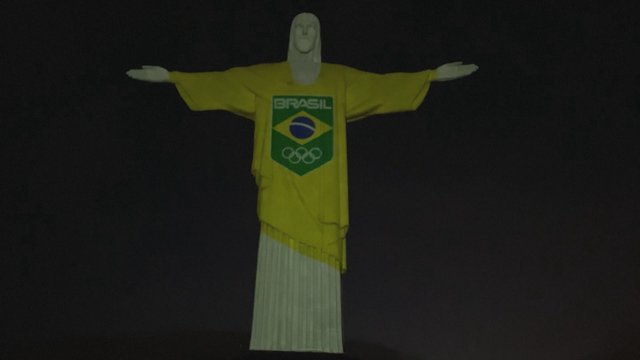 Pasaulis ruošiasi Tokijo olimpinėms žaidynėms: įspūdingai nusidažė Rio de Žaneiro Kristaus atpirkėjo statula