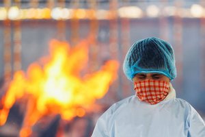 Katastrofišką COVID-19 protrūkio lygį pasiekusi Indija jau gąsdina ir kitas valstybes: ekspertai įspėja