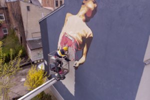 Unikali dovana Kauno miestui gimtadienio proga – ant pastatų sienų įamžinti kultūros simboliai