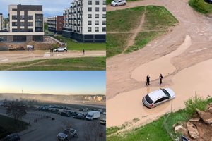 Sostinės mikrorajono gyventojai skundžiasi kelio būkle: atsiradusioje kūdroje bijo paskandinti automobilius