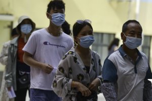 Kinijos pietuose aptikus COVID-19 židinį įvestas lokalus karantinas