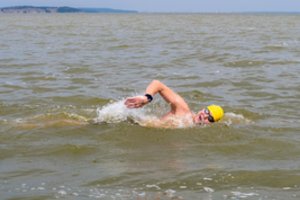 Iki šiol Lietuvoje neregėtą 25 km iššūkį Kuršių mariose greičiausiai įveikė broliai