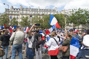 Paryžiuje vyko protestai prieš COVID-19 pasų sistemą
