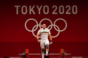 Tokijo olimpiadoje debiutavęs sunkiaatletis A. Šidiškis aplenkė du varžovus