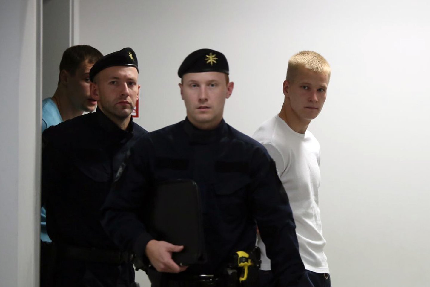  Broliai R.Gudynas ir R.Ščesnavičius teisiamųjų suole atsidūrė po jaunuolio nužudymo.<br> M.Patašiaus nuotr.
