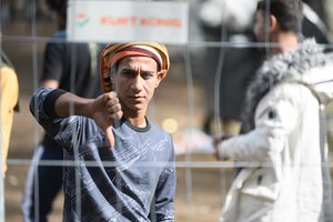 Migrantai iš Baltarusijos aprimo, bet jų stovyklų prižiūrėtojams ir medikams rūpesčių netrūksta