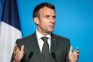 E. Macronas sujudino kampaniją Vokietijoje priimdamas kandidatus prieš balsavimą