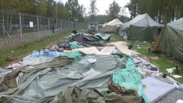 Užfiksuotas paskutinių migrantų išvykimas iš Rūdninkų: palikta stovyklavietė priminė sąvartyną