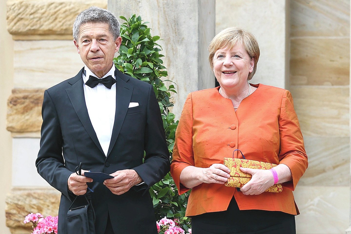 Palikusi kanclerės postą A.Merkel su vyru J.Saueriu liks gyventi Berlyne.<br>AP/„Scanpix“ nuotr.