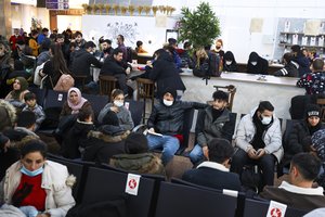 Baltarusija: iš Minsko oro uosto į tėvynę išskrido per 100 migrantų