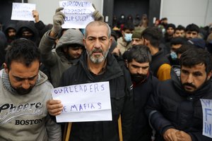 Baltarusijos ir Lenkijos pasienyje migrantai surengė demonstraciją