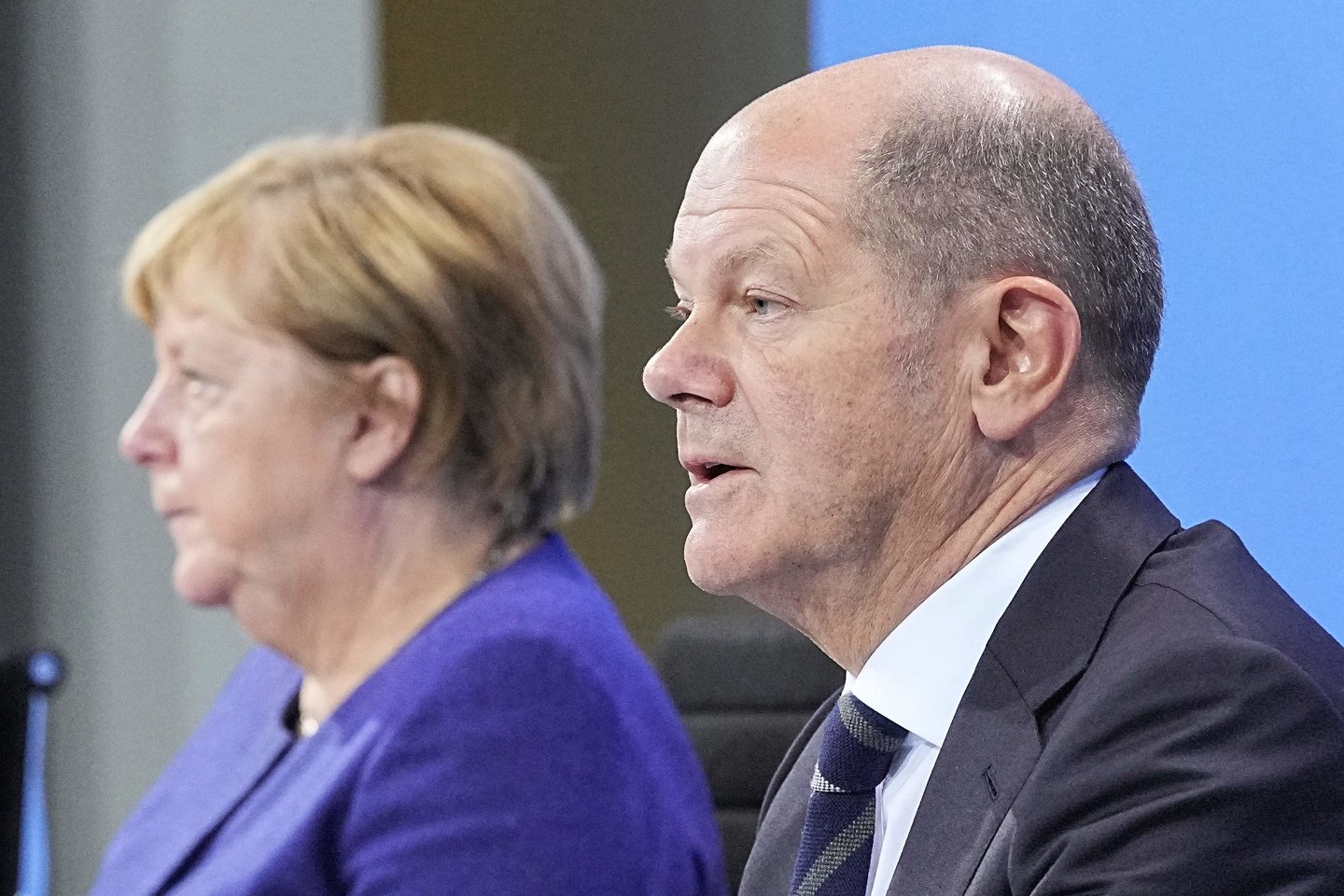 Angela Merkel ir Olafas Scholzas.<br>AFP/Scanpix nuotr.