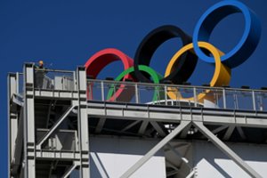 COVID-19 smūgiai: Pekino olimpinė arena žaidynių metu gali neįsileisti žiūrovų