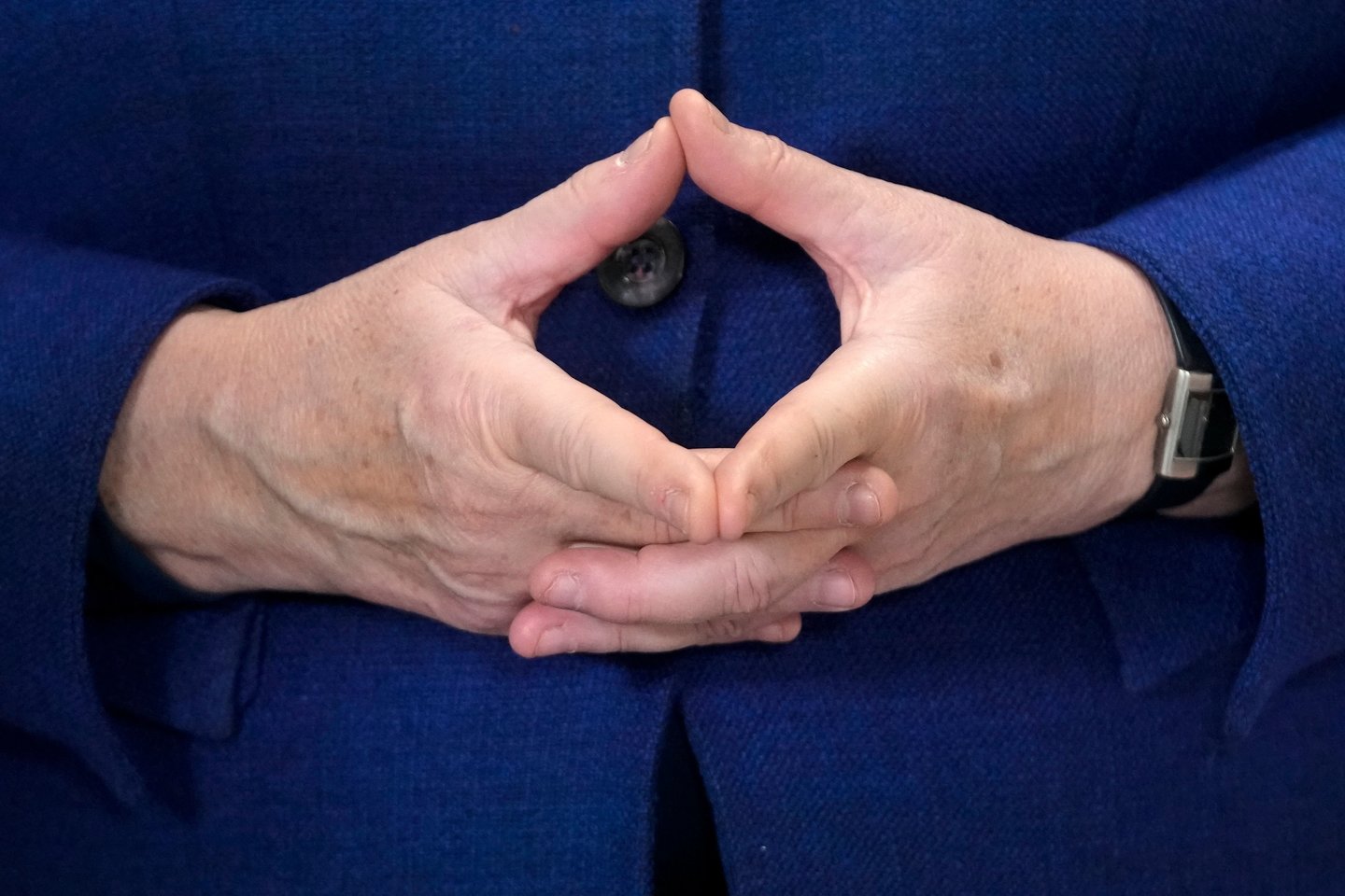 A.Merkel tipiška rankų poza.<br>AFP/Scanpix nuotr.
