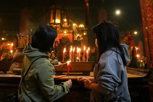 Kinai namuose ir užsienyje pasitinka Tigro metus