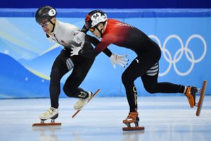 Kinijai – vis daugiau kaltinimų: sportininkai ėmė piktintis dėl teisėjų sprendimų