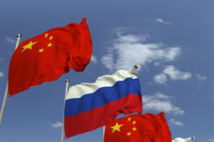 Vakarų šalys baiminasi galinčios susidaryti Rusijos ir Kinijos ašies