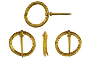 Metalo detektoriumi aptiko neįprastą aukso dirbinį