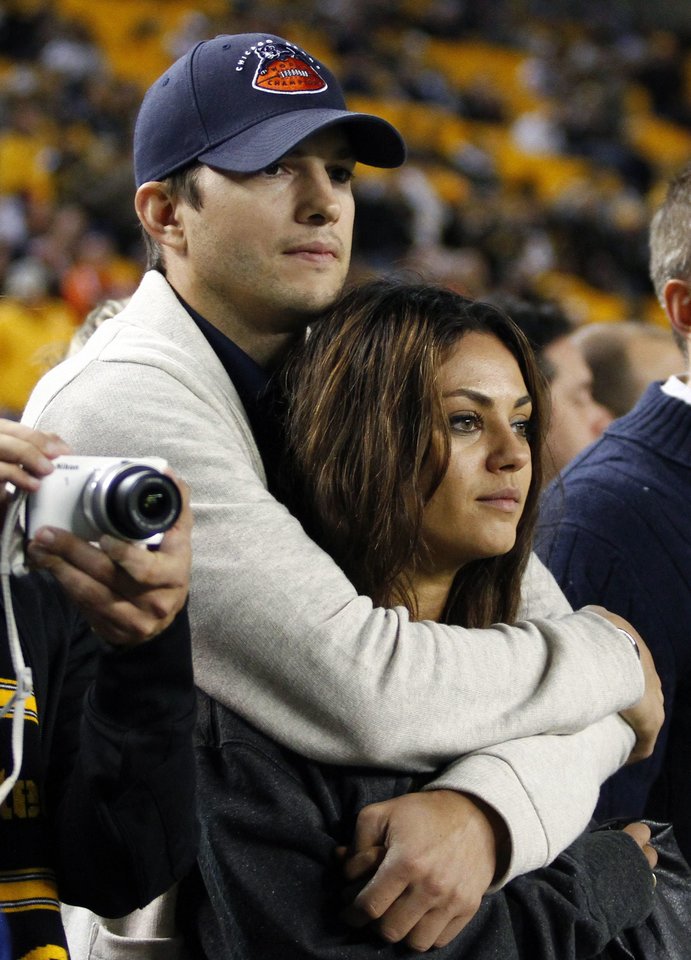 Mila Kunis ir Ashtonas Kutcheris.<br>Scanpix/FP nuotr.