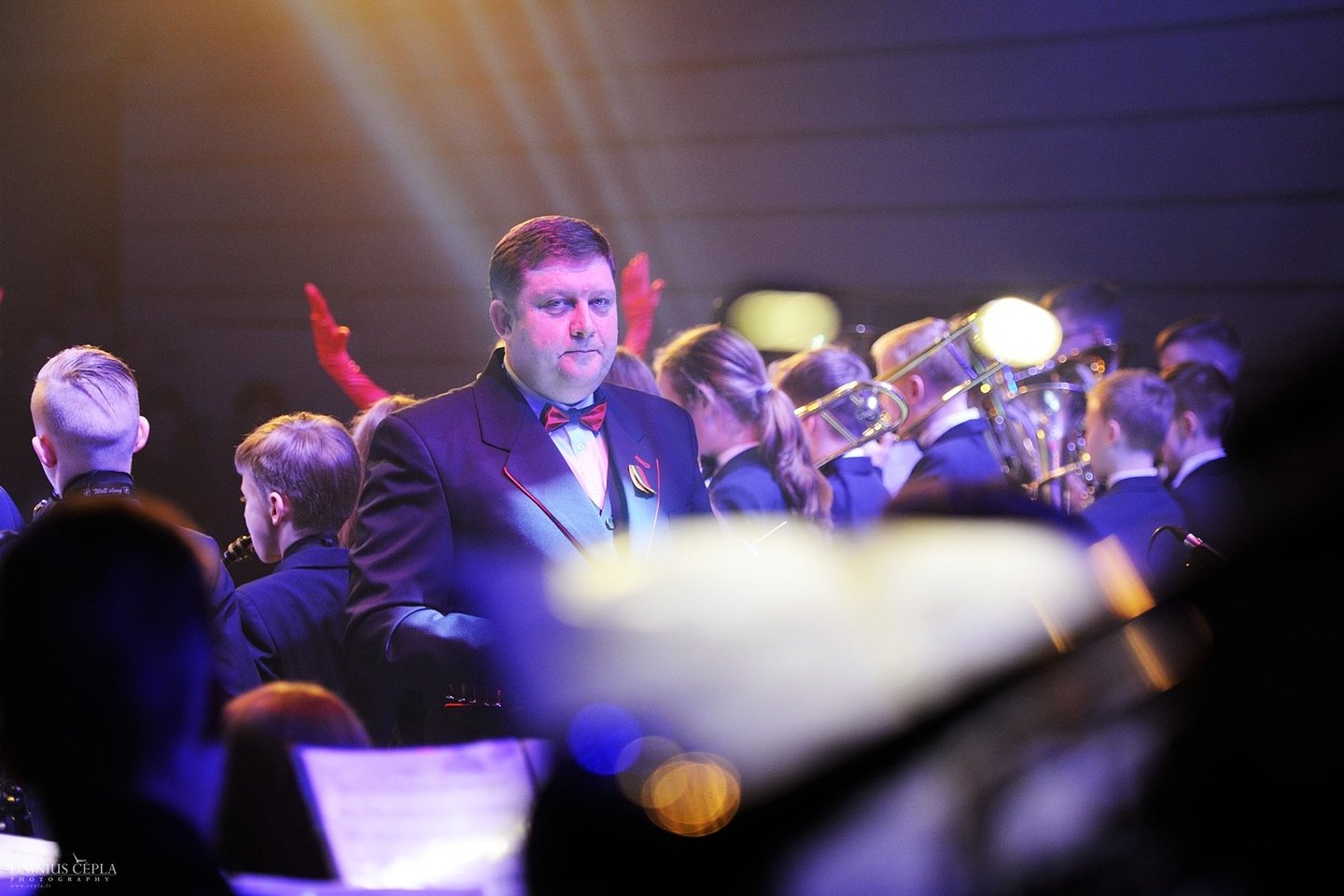 Vilkaviškio jaunimo pučiamųjų instrumentų orkestras ir vadovas Saulius Mickevičius. <br>Rengėjų nuotr.
