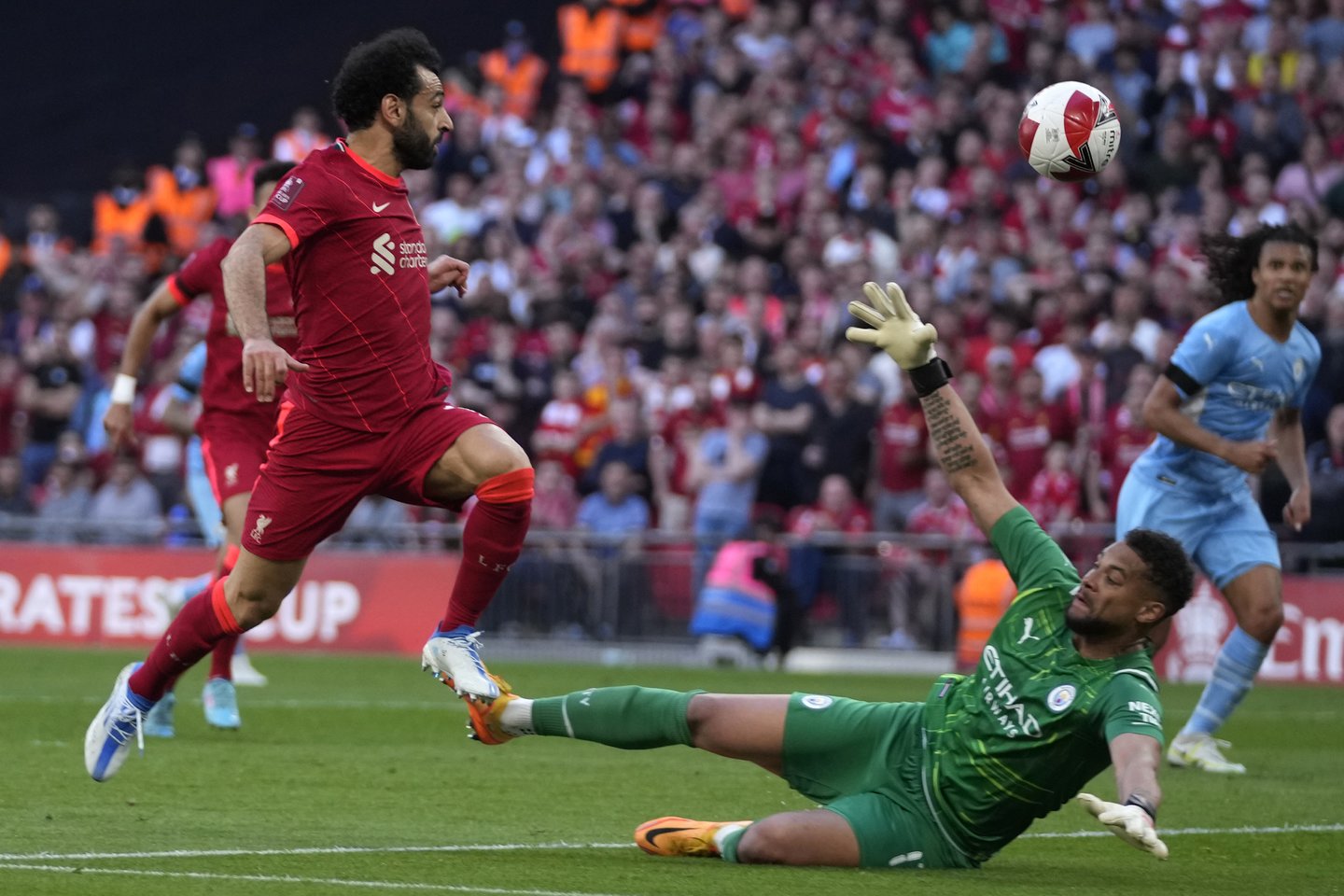 Anglijos FA taurės pusfinalyje „Liverpool“ iškovojo dramatišką pergalę prieš „Manchester City“<br> AP/Scanpix nuotr.