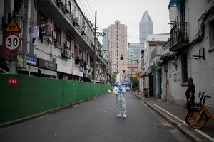 Šanchajuje atšaukti beveik visi karantino ribojimai