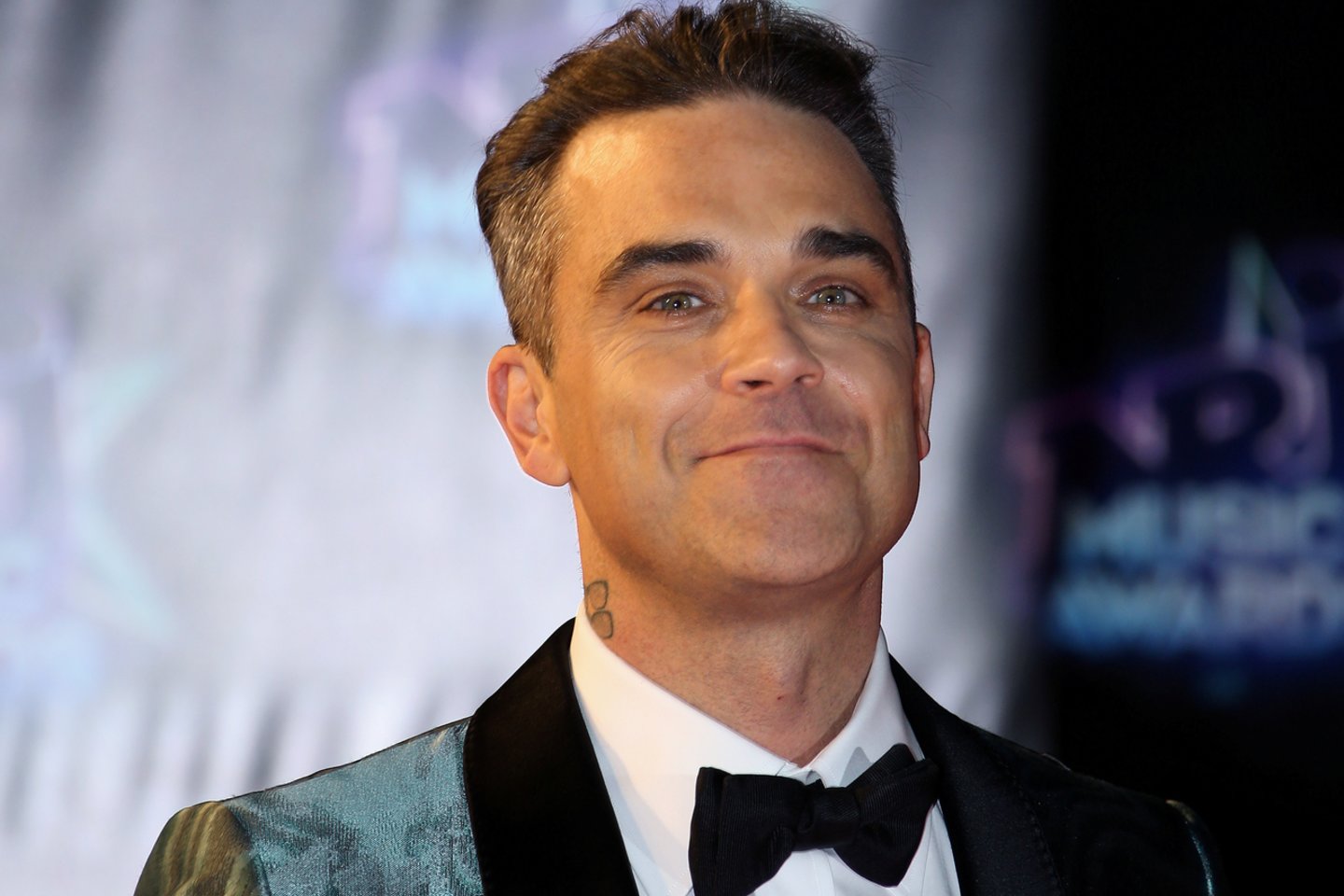  Robbie Williamsas<br> Scanpix/RS nuotr.