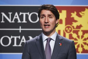 Kanados premjeras sako vyksiantis į G-20 susitikimą, net jei dalyvaus V. Putinas