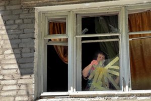 Ištuštėjusiame Slovianske tvyro įtampa: dalis gyventojų kartoja Kremliaus melus, kiti ruošiasi rusų puolimui