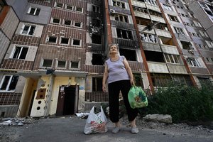 „Mes išgyvenome dar vieną naktį“: Charkovo gyventojai paguodą randa mažoje bendruomenėje